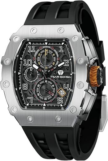 Close-up of a stainless steel square-faced chronograph wristwatch with black strap, multiple subdials, and visible gears (TSAR BOMBA).